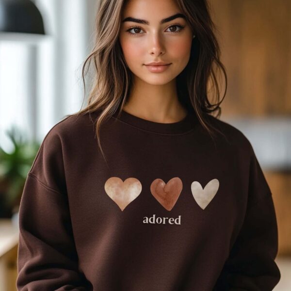 Dark Chocolate sweatshirt with Cute Brown hearts graphic and Adored text– feminine and minimal, from Bhoomkins’ Sweatshirt collection