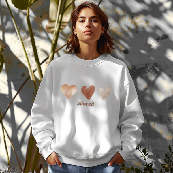 White sweatshirt with Cute Brown hearts graphic and Adored text– feminine and minimal, from Bhoomkins’ Sweatshirt collection