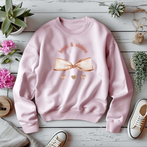 Light Pink sweatshirt with Cute Brown Bow and little hearts graphic and Bows & Ribbons text– feminine and minimal, from Bhoomkins’ Coquette collection