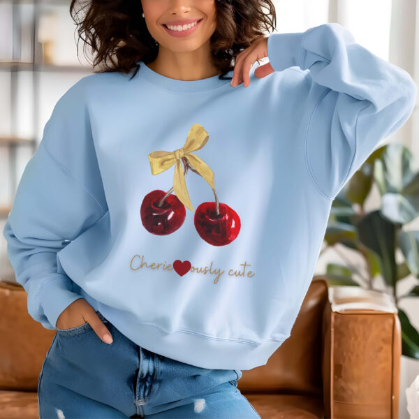 Light Blue sweatshirt with cute cherry and bow print – feminine and minimal, from Bhoomkins’ Cherry collection
