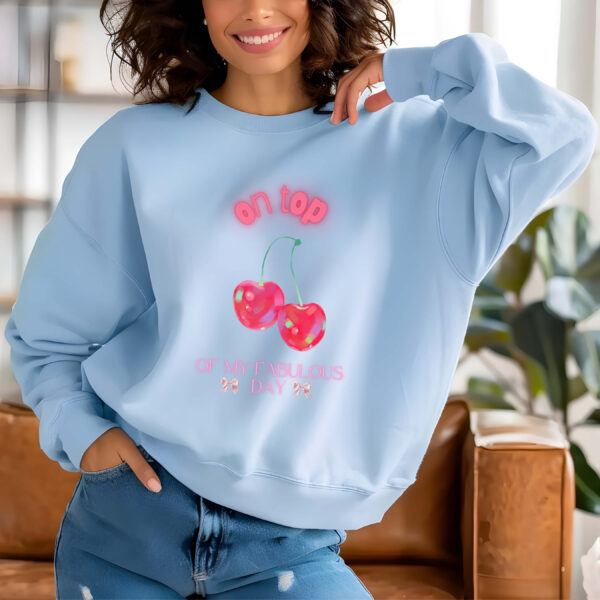 Light Blue sweatshirt with Cute Neon Cherry Print & On Top Of My Fabulous day text– feminine and minimal, from Bhoomkins’ Cherry collection