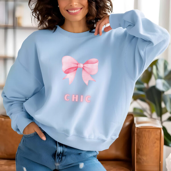 Light Blue sweatshirt with Cute Pink Bow and Chic text – feminine and minimal, from Bhoomkins’ Coquette collection