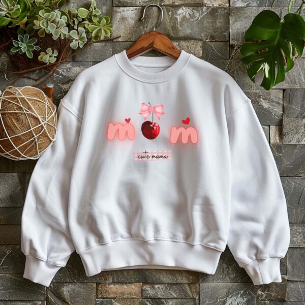 White sweatshirt with Cute Cherry Bow print and Cute mama text– feminine and minimal, from Bhoomkins’ Coquette collection