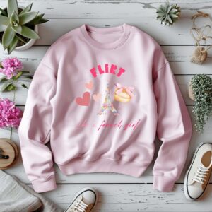 Light Pink sweatshirt with Eiffel Tower & Donut print and Flirt Like A French Girl text– feminine and minimal, from Bhoomkins’ Coquette collection