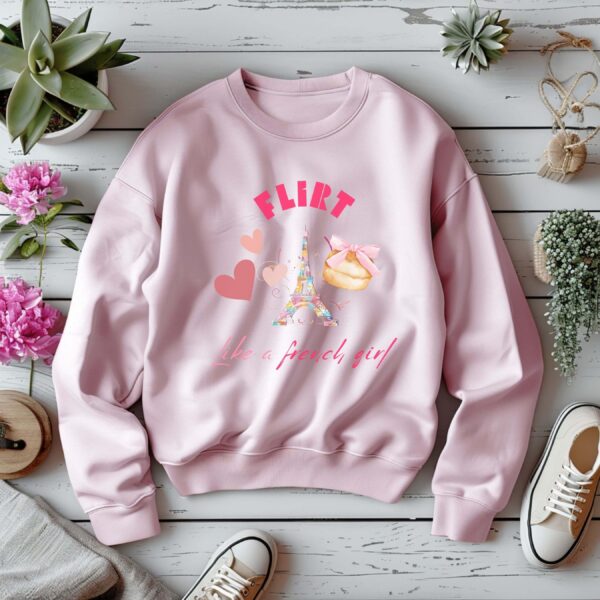 Light Pink sweatshirt with Eiffel Tower & Donut print and Flirt Like A French Girl text– feminine and minimal, from Bhoomkins’ Coquette collection