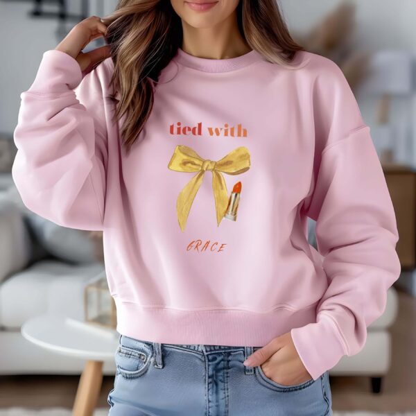 Light Pink sweatshirt with cute mustard bow and Tie with Grace text – feminine and minimal, from Bhoomkins’ Coquette collection
