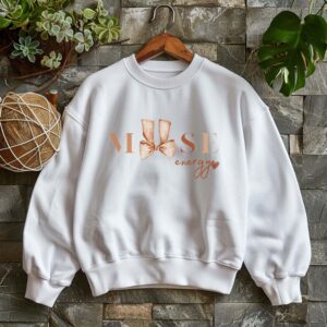 White sweatshirt with cute brown bow print and muse energy text– feminine and minimal, from Bhoomkins’ Coquette collection