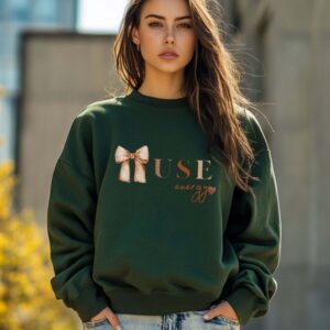 Forest Green sweatshirt with Cute Brown Bow and Muse Energy text – feminine and minimal, from Bhoomkins’ Coquette collection
