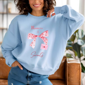 Light Blue sweatshirt with Pink Bow & Love Letter and Ribbons & Secrets text– feminine and minimal, from Bhoomkins’ Coquette collection