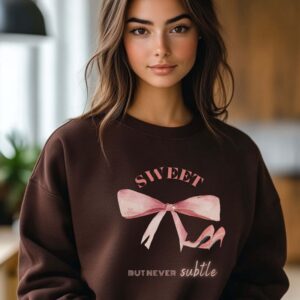 Dark Chocolate sweatshirt with Cute Pink Bow and Heels and Sweet But Never Subtle text – feminine and minimal, from Bhoomkins’ Coquette collection
