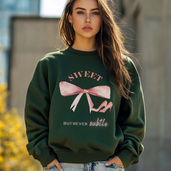 Forest Green sweatshirt with Cute Pink Bow and Heels and Sweet But Never Subtle text – feminine and minimal, from Bhoomkins’ Coquette collection