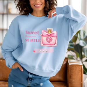 Light Blue sweatshirt with Cute Perfume Bottle and Sweet But Never Subtle text – feminine and minimal, from Bhoomkins’ Boldly Feminine collection