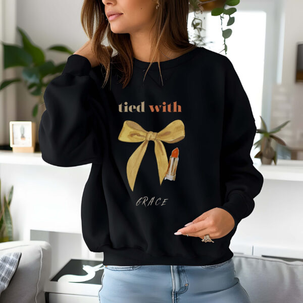 Black sweatshirt with cute mustard bow and Tie with Grace text – feminine and minimal, from Bhoomkins’ Coquette collection