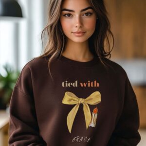 Dark Chocolate sweatshirt with cute mustard bow and Tie with Grace text – feminine and minimal, from Bhoomkins’ Coquette collection