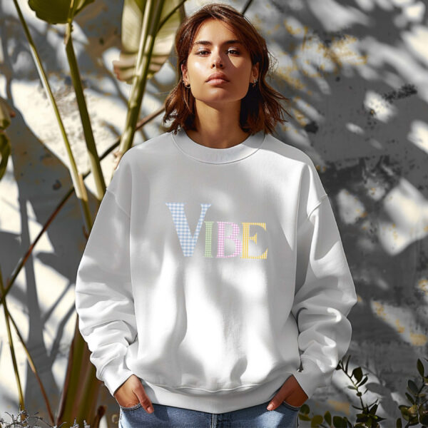 White sweatshirt with pastel checked letters spelled as Vibe – feminine and minimal, from Bhoomkins’ Sweatshirts collection