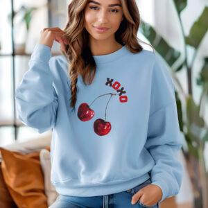 Light Blue sweatshirt with cute cherry print and XOXO text– feminine and minimal, from Bhoomkins’ cherry collection